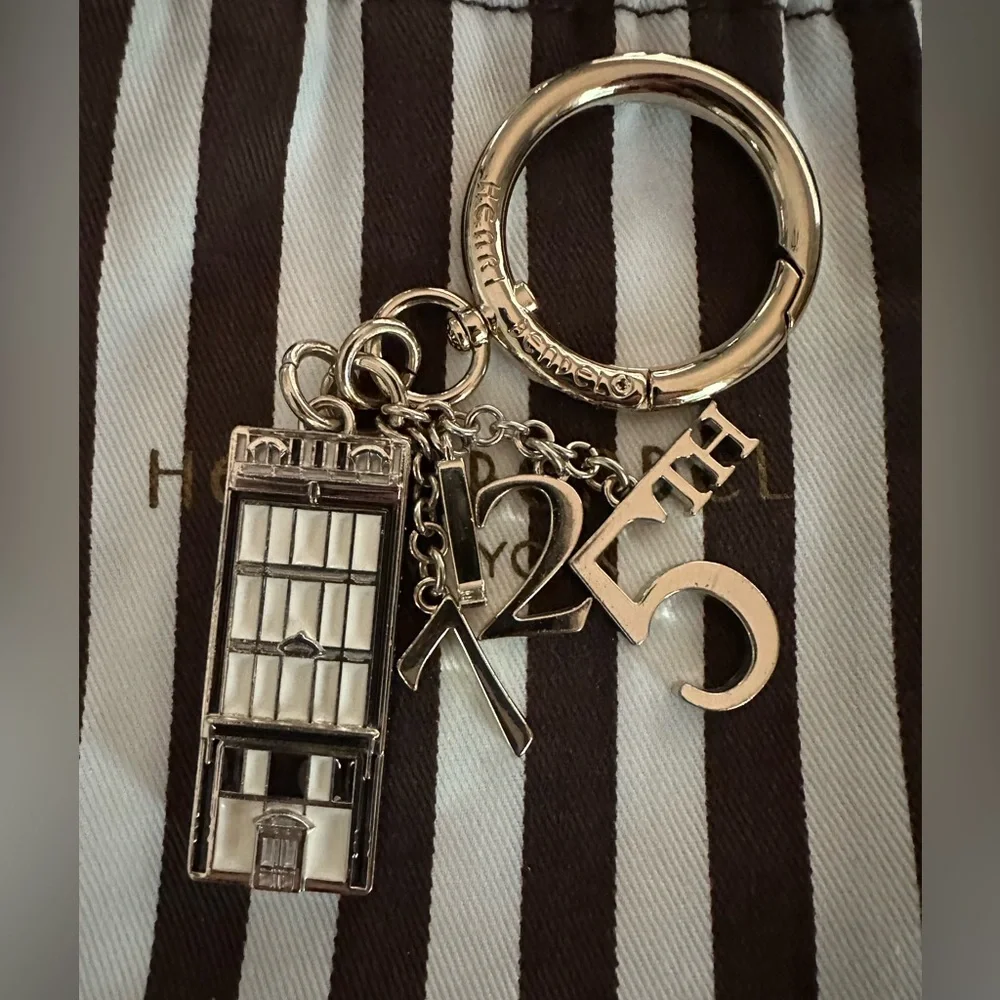 Gorgeous Henri Bendel Iconic 712  5th Avenue Gold Keychain Fob Bag Charm VGUC